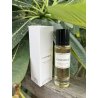 Lattafa Perfume GANYMEDE EDP 30 ml — товар в стилизованной композиции; очень крупный план; среди зелени; самый широкий кадр
