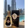 Kristal EDP 50 ml — товар в стилизованной композиции; очень крупный план; на открытом воздухе; самый широкий кадр