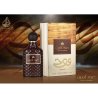 Lattafa Perfume OUD THAMEEN EDP 100 ml — product in een gestileerde setting; zeer nabije close-up; op een houten oppervlak