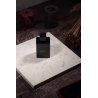Glorious MARLON Extrait de Parfum 100 ml — товар в стилизованной композиции; очень крупный план; на деревянной поверхности