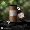 Fragrance World Amber Neroli EDP 100 ml — товар в стилизованной композиции; очень крупный план; на каменной поверхности