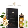 Matin Martin JAMEELA EDP 100 ml — product in een gestileerde setting; close-up; tussen groen
