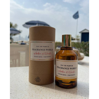 Fragrance World Amber Neroli EDP 100 ml — товар в стилизованной композиции; очень крупный план; на открытом воздухе