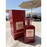 Fragrance World Cherry Buzz EDP 80 ml — product in een gestileerde setting; zeer nabije close-up; buiten