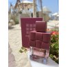 Ambroise Pour Femme EDP 100 ml — product in een gestileerde setting; zeer nabije close-up; buiten; ruimste kadrering