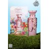 Fragrance World Bouquet of Euphoria EDP 100 ml — toode stiliseeritud keskkonnas; lähivaade; roheluse keskel