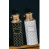 Gulf Orchid Treasure EDP 100 ml — προϊόν σε στιλιζαρισμένο σκηνικό; πολύ κοντινό πλάνο; σε ξύλινη επιφάνεια