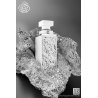 Fragrance World Varakh Silver EDP 100 ml — товар в стилизованной композиции; очень крупный план; на каменной поверхности