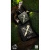Fragrance World Imperium X EDP 100 ml — product in een gestileerde setting; zeer nabije close-up; tussen groen