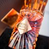 Fragrance World Royal Blend Bourbon EDP 100 ml — productweergave; zeer nabije close-up; op een donkere achtergrond