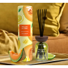 Gulf Orchid MELON & LIME 150 ml — toode stiliseeritud keskkonnas; väga lähivõte; puitpinnal