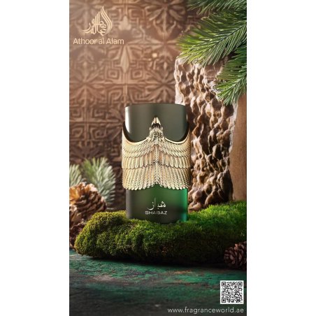 Fragrance World Shabaz EDP 100 ml — toode stiliseeritud keskkonnas; väga lähivõte; roheluse keskel