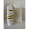 Lattafa Perfume Yara Moi 20 ml — product en verpakking; zeer nabije close-up; op een witte achtergrond