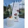 Royal Platinum Platinum ROSE & AMBER 120 ml — product in een gestileerde setting; zeer nabije close-up; buiten