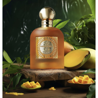 Paris Corner Mango Punch EDP 100 ml — товар в стилизованной композиции; очень крупный план; среди зелени