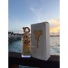 Fragrance World Allure Couture EDP 100 ml — toode stiliseeritud keskkonnas; väga lähivõte; õues; lähim kadreering