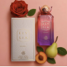 Fragrance World Elysia Elegance EDP 100 ml — toode stiliseeritud keskkonnas; väga lähivõte; lilledega