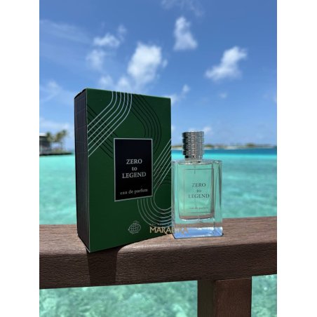 Fragrance World Zero to Legend EDP 100 ml — товар в стилизованной композиции; очень крупный план; на открытом воздухе