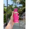 Fragrance World Vulcan Baie EDP 100 ml — toode stiliseeritud keskkonnas; väga lähivõte; roheluse keskel