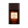 Fragrance World Oud Intense Saffron EDP 100 ml — product van voren; volledige compositie; op een houten oppervlak