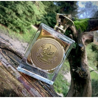 Lattafa Perfume Mithqal EDP 100 ml — product in a styled setting; tight close-up; on a wooden surface