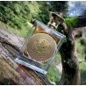 Lattafa Perfume Mithqal EDP 100 ml — product in a styled setting; tight close-up; on a wooden surface
