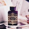 Lattafa Perfume Bade'e Al Oud Amethyst EDP 100 ml — produktas ir pakuotė; visa kompozicija; baltame fone