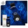 Fragrance World Adicto Noir EDP 100 ml — produktas stilizuotoje aplinkoje; stambus planas; su gėlėmis