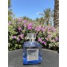 Barakkat Aqua Stellar 100 ml — toode stiliseeritud keskkonnas; väga lähivõte; roheluse keskel; keskmine kadreering