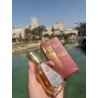 Barakkat Rouge 540 Extrait 50 ml — товар в стилизованной композиции; очень крупный план; на открытом воздухе; самый близкий кадр