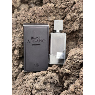 Black Afgano EDP 60 ml — товар в стилизованной композиции; очень крупный план; на каменной поверхности; самый близкий кадр