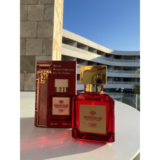 Marque 169 EDP 25 ml — товар в стилизованной композиции; очень крупный план; на открытом воздухе; очень широкий кадр