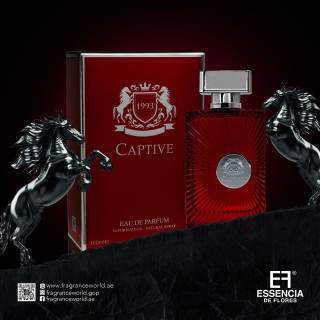 Fragrance World Captive EDP 100 ml — упаковка товара; крупный план; на тёмном фоне