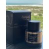 Lattafa Perfume Tamima EDP 100 ml — toode stiliseeritud keskkonnas; väga lähivõte; roheluse keskel