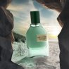 Fragrance World Aqua Pura EDP 70 ml — product in a styled setting; tight close-up; outdoors; widest framing