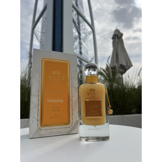 Lattafa Perfume Mango Musk 100 ml — product in a styled setting; tight close-up; outdoors; closest framing