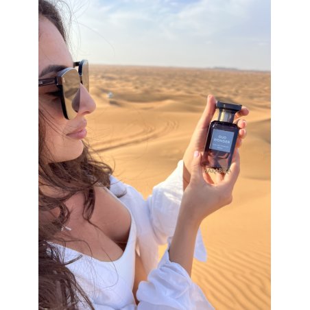Fragrance World Oud Wonder EDP 80 ml — product in a styled setting; tight close-up; outdoors; widest framing