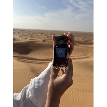 Fragrance World Oud Wonder EDP 80 ml — product in a styled setting; tight close-up; outdoors; closest framing