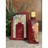 Lattafa Perfume Barez EDP 100 ml — товар в стилизованной композиции; очень крупный план; среди зелени; самый близкий кадр
