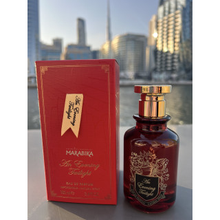 An Evening Twilight EDP 100 ml — товар в стилизованной композиции; очень крупный план; на открытом воздухе; самый широкий кадр