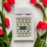 Lattafa Perfume Rave Now White EDP 100 ml — продукт в стилизирана композиция; много близък план; с цветя; най-близък кадър