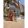 Francique 63,55 EDP 100 ml — товар в стилизованной композиции; очень крупный план; среди зелени; самый близкий кадр