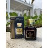 Fragrance World Marque 214 EDP 25 ml — produktas stilizuotoje aplinkoje; stambus planas; baltame fone; artimiausias kadras