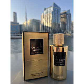 De Costa Absolute EDP 100 ml — товар в стилизованной композиции; очень крупный план; на открытом воздухе; близкий кадр