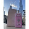 Bab Al Wardi EDP 100 ml — товар в стилизованной композиции; очень крупный план; на открытом воздухе; самый близкий кадр