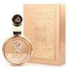 Lattafa Perfume Fakhar Extrait Gold EDP 100 ml — товар и упаковка; очень крупный план; на белом фоне