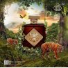 Fragrance World Apex EDP 100 ml — товар в стилизованной композиции; очень крупный план; среди зелени; самый близкий кадр