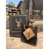 Fragrance World Imperial EDP 100 ml — product in een gestileerde setting; zeer nabije close-up; buiten