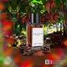 Fragrance World C.A.C.A.O EDP 100 ml — товар в стилизованной композиции; очень крупный план; среди зелени; самый широкий кадр
