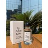 Fragrance World No.4 After Love EDP 100 ml — produkt i en stylad miljö; mycket tät närbild; utomhus